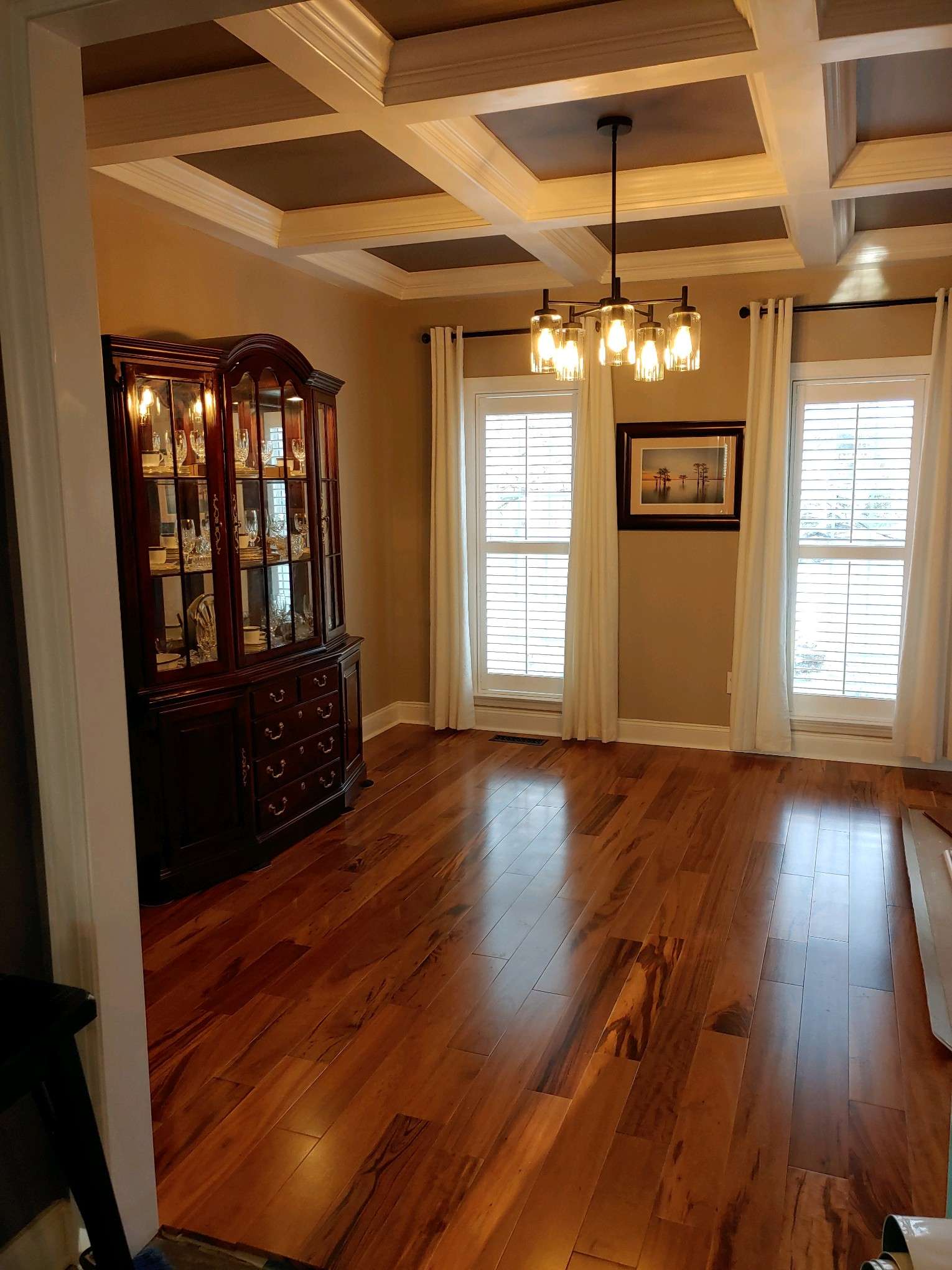 Dining room with a coffered ceiling